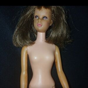 Mattel Vintage Francie doll, brunette, straight legs, 1965.